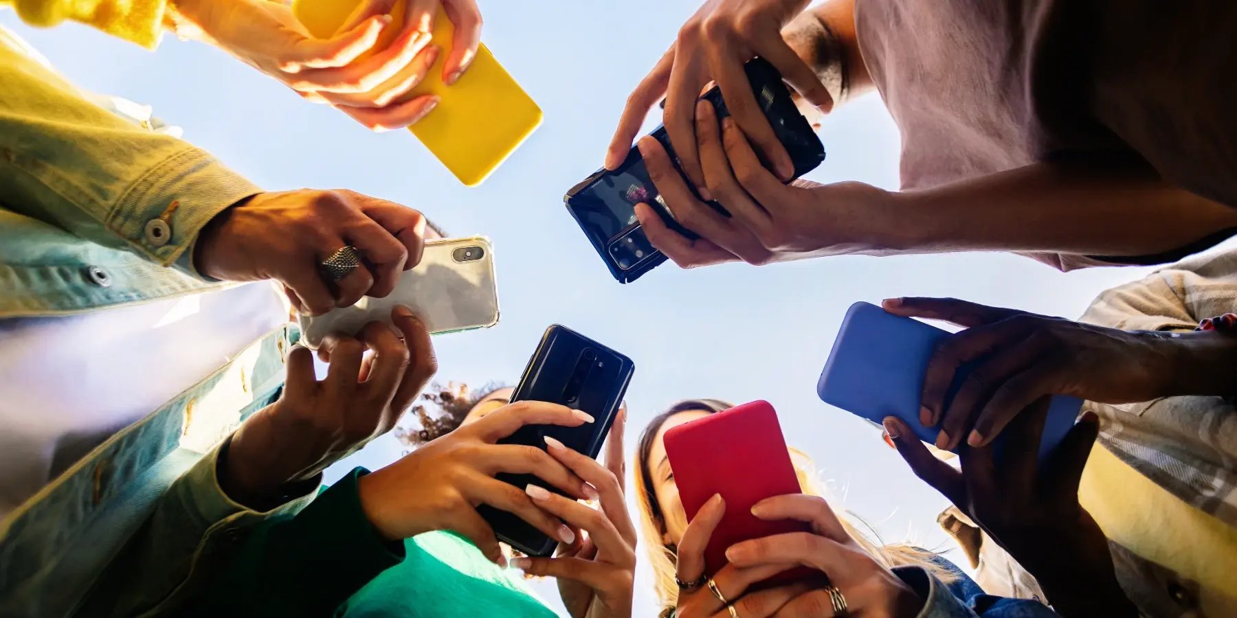 group of people using their phones to call congress
